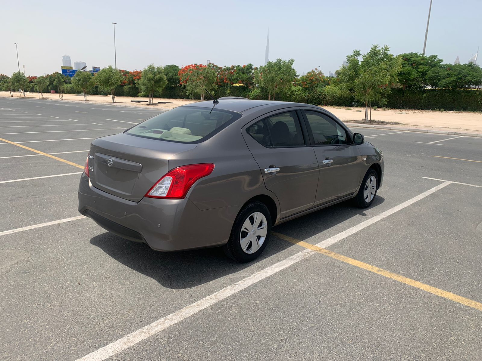 
								2022 | Nissan Sunny | Dark brown full									