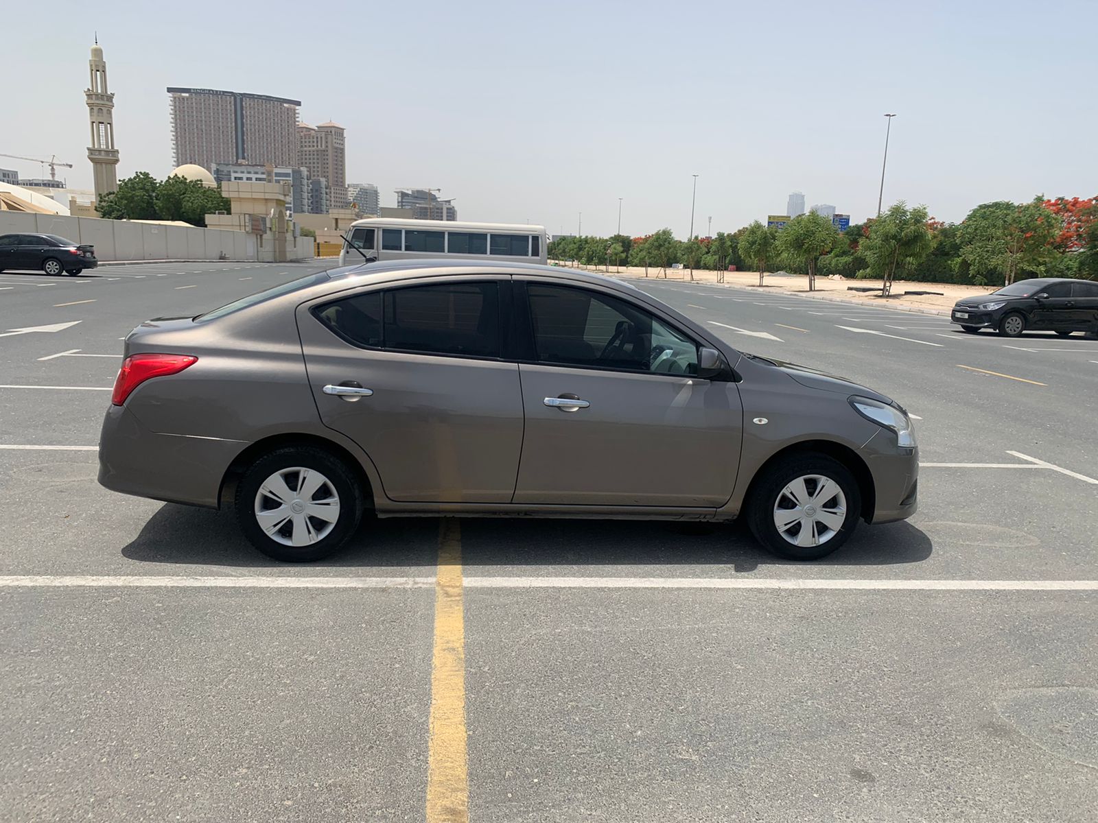 
								2022 | Nissan Sunny | Dark brown full									